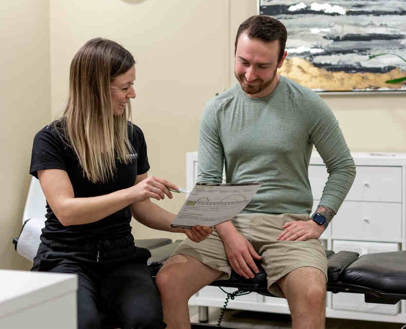 Chiropractor Explaining Process